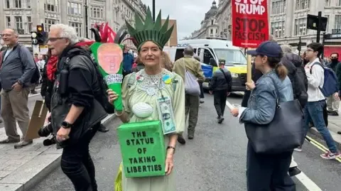 Numerous Activists Converge in Central London to Oppose Donald Trump's Return Diplomatic Journey